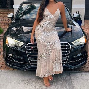 luxxel | gold sequined gala gown